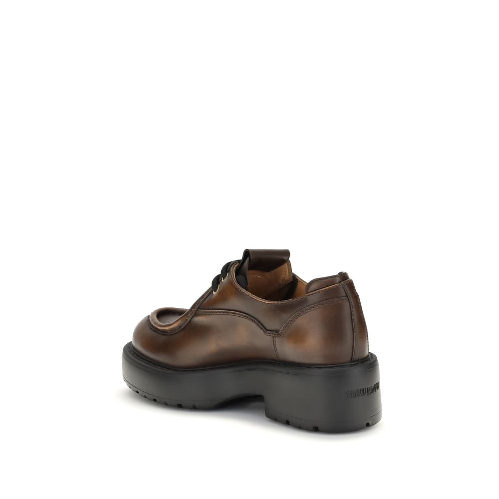 Miu Miu Brown Calf Leather Bos Taurus Platform Loafers